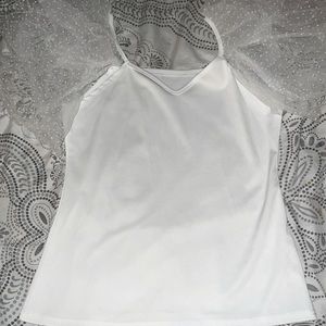 A white Lacey puffy sleeves with polkadots